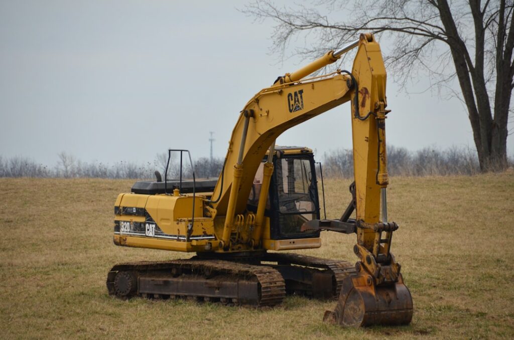 Yellow 2024 Caterpillar 320 Next Gen Heavy Excavator Photo 2