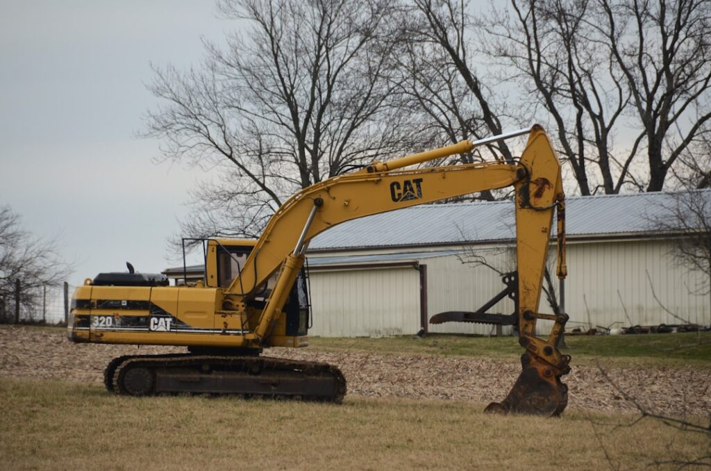 Yellow 2024 Caterpillar 320 Next Gen Heavy Excavator Photo 3